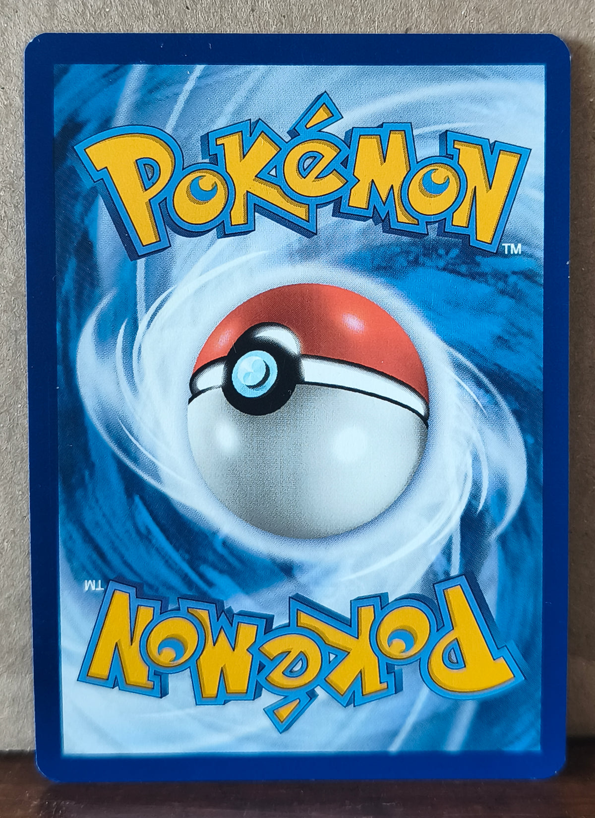 Carte Pokémon Riolu 215/198 Illustration Rare Écarlate et Violet, verso de l'exemplaire vendu